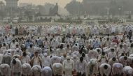 Indonesian Muslims pray for rain during a long drought season and haze in Pekanbaru, Riau province, Indonesia, September 11, 2019, in this photo taken by Antara Foto. Antara Foto/Rony Muharrman/ via REUTERS