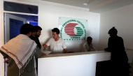 FILE PHOTO: Pakistani men sign up for Chinese language classes at the China Pak Cultural Educational Institute in Islamabad, Pakistan June 9, 2017. REUTERS/Caren Firouz/File Photo