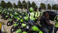 ORide drivers park motorbike taxis to attend meeting at company headquaters, Ikeja in Lagos, on August 19, 2019. AFP / Pius Utomi Ekpei  