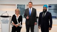 Green Party leader Elizabeth May, Conservative leader Andrew Scheer and New Democratic Party (NDP) leader Jagmeet Singh pose at the start of the Maclean's/Citytv National Leaders Debate on the second day of the election campaign in Toronto, Ontario, Canad
