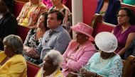 Church members aand some supporters of Joe Biden listen to his speach at the 