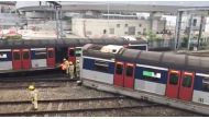 Emergency crew are seen at a derailed train wreckage near Hung Hom station on the MTR East Rail Line following an accident on a train bound for Mong Kok East in Hong Kong, China September 17, 2019 still image taken from a social media video. @SEELIFEHK vi