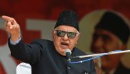 In this file photo taken on April 15, 2019 former Jammu and Kashmir chief minister Farooq Abdullah (C) speaks during an election campaign in Srinagar.  / AFP / Tauseef MUSTAFA 