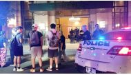 People and police officers stand outside Trump Plaza after a car crashed into the building's lobby in New Rochelle, New York, U.S., September 17, 2019, in this still image from video obtained via social media. Jose Abarca via Reuters
