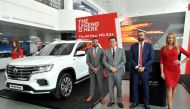 Ihab El Feky (centre), Chief Operations Officer, Nasser Bin Khalid (NBK) Group; Karim Monir (left), Head of Marketing, Auto Class Cars; and Tamer Abdallah, MG Brand Manager in Qatar; at the official launch of the new MG RX8 held at the MG Showroom in Doha