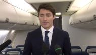 Canada's Prime Minister Justin Trudeau apologizes for wearing brownface makeup in 2001, to reporters on the Liberal party leader's election campaign jet in Halifax, Nova Scotia, Canada in a still image from video September 18, 2019. CBC via REUTERS.