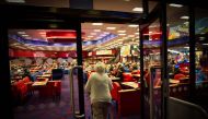 Customers play bingo at the MECCA Bingo Hall in the East End of Glasgow, Scotland on August 15, 2019. AFP / Andy Buchanan