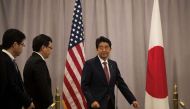 Japan Prime Minister Shinzo Abe arrives to speak to reporters following a meeting with President-elect Donald Trump, November 17, 2016 in New York City. Drew Angerer / Getty Images / AFP