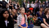 Sixteen year-old Swedish climate activist Greta Thunberg listens to speakers during a climate change demonstration at the US Supreme Court in Washington, September 18, 2019. Reuters/Kevin Lamarque