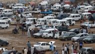 People gather at the Sunday car market in Karachi, Pakistan, July 26, 2015. AFP