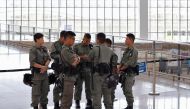 Riot police stand inside Hong Kong International Airport in Hong Kong, China September 22, 2019. REUTERS/Jorge Silva