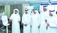 QC Chairman Sheikh Khalifa bin Jassim Al Thani (second left) and QC First Vice-Chairman, Mohamed bin Ahmed bin Towar Al Kuwari (second right), and other officials during the event.