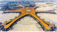 (FILES) This file photo taken on June 28, 2019 shows the terminal of the new Beijing Daxing International Airport. A futuristic new airport in Beijing, which is expected to become one of the busiest in the world, was opened by President Xi Jinping on Sept