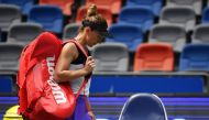 Simona Halep of Romania leaves the court following her third round women's singles match against Elena Rybakina of Kazakhstan at the Wuhan Open tennis tournament in Wuhan on September 25, 2019. / AFP / HECTOR RETAMAL