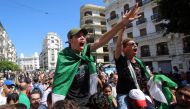 Demonstrators gesture and shout slogans during a protest demanding social and economic reforms, as well as the departure of the country's ruling elite in Algiers, Algeria, September 24, 2019. REUTERS/Ramzi Boudina