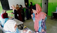 Afghan women arrive to cast their votes in the presidential election in Kabul, Afghanistan September 28, 2019. REUTERS/Mohammad Ismail