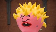 An inflatable effigy resembling Boris Johnson is seen amid a demonstration in central Manchester on September 29, 2019. AFP / Oli Scarff 