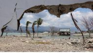 Ruins and damaged building are pictured nearly one year after an earthquake and tsunami at a beach in Palu, Central Sulawesi, Indonesia, September 26, 2019. Antara Foto/Oscar Motuloh/ via Reuters