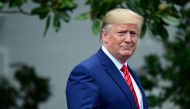 FILE PHOTO: US President Donald Trump arrives for a photo opportunity with sheriffs from across the country on the South Lawn of the White House in Washington, U.S., September 26, 2019. REUTERS/Erin Scott/File Photo