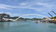 This general view shows a bridge after it collapsed in the Nanfangao fish harbour in Suao township on October 1, 2019. AFP / Sam YEH