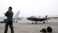 A South Korean fighter pilot stands next to his F-35 stealth fighter during a ceremony to mark the 71st Armed Forces Day at the Air Force Base in Daegu, South Korea, October 1, 2019. Jeon Heon-kyun/Pool via REUTERS