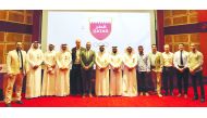 Officials of Qatar and France posing for a group picture.
