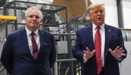 (FILES) In this file photo taken on September 22, 2019 US President Donald Trump speaks as Australian Prime Minister Scott Morrison looks on in a visit to Pratt Industries during the plant's opening in Wapakoneta, Ohio. AFP / SAUL LOEB