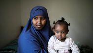 Ramlo Ali Noor, whose immediate family is affected by the Trump administration's cap on refugee numbers, poses at her apartment with her daughter Sumayo in Columbus, Ohio, US September 27, 2019. Reuters/Maddie McGarvey
