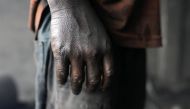 Hand of a child worker is pictured at a dockyard in Dhaka, Bangladesh, September 20, 2018. Reuters/Mohammad Ponir Hossain