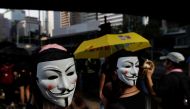 Anti-government protesters wearing masks attend a protest in central Hong Kong, China October 5, 2019. REUTERS/Jorge Silva
