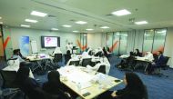 A provided picture of a session being attended by Qatar Finance and Business Academy’s (QFBA) clients. 