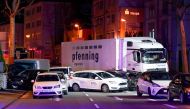 A truck stands beside damaged cars in Limburg, Germany, October 7, 2019, after several people were injured when a stolen truck drove into vehicles during rush hour. Picture taken October 7, 2019. Reuters/Stringer