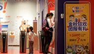A boy waits to enter the NBA Playzone, an NBA-themed indoor playground, at a shopping mall in Beijing, China October 9, 2019. REUTERS/Jason Lee