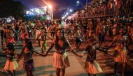 Munduruku indigenous people take part in a parade commemorating the Independence Day, in Itaituba, -a town along a section of the trans-Amazonian highyway-, Para state, Brazil, on September 7, 2019.  AFP / Nelson Almeida 