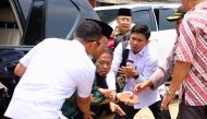 Indonesian Chief Security Minister Wiranto is pictured as he being attacked during his visit in Pandeglang, Banten province, October 10, 2019 in this photo taken by Antara Foto. (via Reuters) 