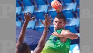 Brazil’s Nascimento de Medeiros prepares to shoot against Oman during their opening match at Al Gharafa, yesterday.