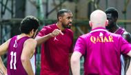 Qatari basketball legend, Yasseen Musa speaking to members of the 3x3 Basketball team during a training session at the Katara Beach, yesterday.