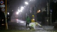 Roads are flooded due to heavy rains caused by Typhoon Hagibis at Setagaya ward in Tokyo, Japan, October 12, 2019.