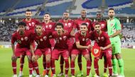 Qatar's starting eleven pose for a group picture ahead of the World Cup 2022 Asian qualifying match between Qatar and Oman at the Janoub Stadium in the Qatari capital Doha on October 15, 2019. AFP / Karim Jaafar 