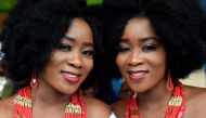 Identical twin sisters Kehinde Olofin (L) and Taye Olofin (R) attends Igbo-Ora World Twins festival to celebrate the uniqueness in multiple births at Igbo-Ora Town in Oyo State, southwest Nigeria, on October 12, 2019. AFP / PIUS UTOMI EKPEI