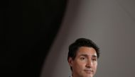 In this file photo taken on October 7, 2019 Canadian Prime Minister and Liberal Party leader Justin Trudeau listens to questions during a press conference after the Federal Leaders Debate at the Canadian Museum of History in Gatineau, Quebec. / AFP / Dave