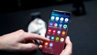 FILE PHOTO: A journalist uses the new Samsung Galaxy S10 smartphone at a press event in London, Britain February 20, 2019. REUTERS/Henry Nicholls/File Photo