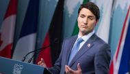 Canadian Prime Minister Justin Trudeau addresses a press conference at the conclusion of the G7 summit in La Malbaie Quebec on June 9 2018 AFP Lars Hagberg
