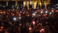 People attend a prayer rally to show support for pro-democracy protesters in Hong Kong on October 14, 2019.  AFP / DALE DE LA REY