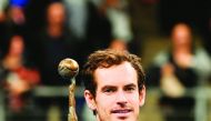 Britain's Andy murray celebrates with the trophy after winning against Switzerland's Stanislas Wawrinka in their men's single tennis final match of the European Open ATP Antwerp, on October 20, 2019 in Antwerp. AFP / BELGA / John Thys