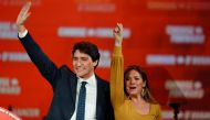 Liberal leader and Canadian Prime Minister Justin Trudeau and his wife Sophie Gregoire Trudeau wave to supporters after the federal election at the Palais des Congres in Montreal, Quebec, Canada October 22, 2019. Reuters/Carlo Allegri