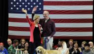 Elizabeth Warren and husband Bruce Mann and their dog Bailey take the stage on January 12, 2019 as part of her exploratory presidential committee at Manchester Community College. AFP / Joseph Prezioso