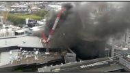 Smoke rises as fire blazes at Sky City Convention Centre, which is under construction in Auckland, New Zealand, October 22, 2019, in this still image taken from video obtained from social media. Amy Wadsworth via REUTERS 