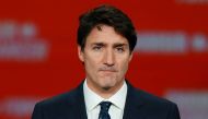 Liberal leader and Canadian Prime Minister Justin Trudeau stands on stage after the federal election at the Palais des Congres in Montreal, Quebec, Canada October 22, 2019. REUTERS/Carlo Allegri