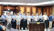This handout photograph taken on October 17, 2019 and released on October 23 by the Nanning Intermediate People's Court, shows six men convicted of attempted murder charges during their sentencing at the Nanning Intermediate People's Court, in China's sou